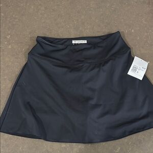 New w/ tags Forever 21 black active skort w/ compression shorts. Size small.